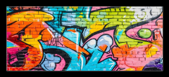 Skleněný obraz 1D panorama - 120 x 50 cm F_AB715124495 - wall scratched with colorful graffiti and drawings. colorful graffiti brick wall urban visual
