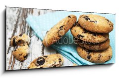 Sklenn obraz 1D panorama - 120 x 50 cm F_AB75839613 - Chocolate cookies on wooden table - okoldov suenky na devnm stole