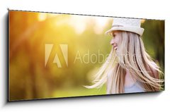 Skleněný obraz 1D panorama - 120 x 50 cm F_AB76895650 - Beautiful woman outside in a park. - Krásná žena venku v parku.