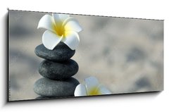 Obraz 1D panorama - 120 x 50 cm F_AB92571268 - Spa stones with flowers on sand beach close up