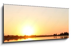 Skleněný obraz 1D panorama - 120 x 50 cm F_AB95968412 - Golden sunrise over calm water - Zlatý východ slunce nad klidnou vodou