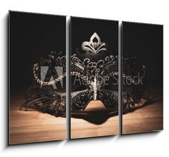 Obraz 3D tdln - 105 x 70 cm F_BB311256147 - A portrait of a traditional venetian mask on a wooden surface appearing mysteriously out of the darkness.