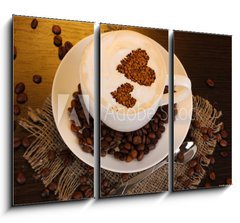 Obraz   Latte on wooden table on brown background, 105 x 70 cm