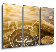 Obraz 3D tdln - 105 x 70 cm F_BB60262537 - compass on the shore at sunrise