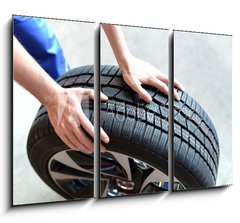 Obraz 3D tdln - 105 x 70 cm F_BB66921054 - Reifenwechsel in einer KFZ Werkstatt // Tire change by mechanic - Reifenwechsel in einer KFZ Werkstatt // Zmna pneumatik mechanikem