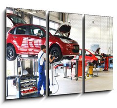 Obraz   Reifenwechsel in einer KFZ Werkstatt // Tire change by mechanic, 105 x 70 cm