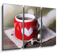 Obraz 3D tdln - 105 x 70 cm F_BB71618914 - Cup of tasty hot tea, on wooden table, on light background