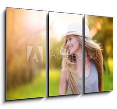 Obraz 3D tdln - 105 x 70 cm F_BB76895615 - Beautiful woman outside in a park.