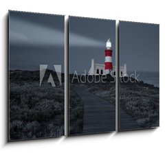 Obraz   Lighthouse with shining light in darkness and dark blue clouds a, 105 x 70 cm