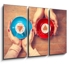 Obraz 3D tdln - 105 x 70 cm F_BB79045228 - Women and man holding cups of coffee