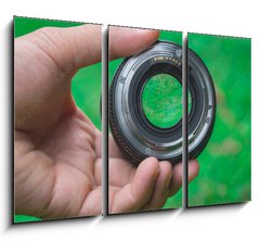 Obraz 3D tdln - 105 x 70 cm F_BB88270999 - Mobile lenses on a green lawn.