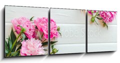 Obraz 3D tdln - 150 x 50 cm F_BM313371368 - Pink peony flowers on white wooden table. womans day or wedding background. Top view.