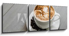 Obraz 3D tdln - 150 x 50 cm F_BM320686754 - Fresh brewed coffee with fern pattern latte art in white cup