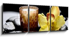 Obraz 3D tdln - 150 x 50 cm F_BM34861680 - aromatherapy candle and zen stones with yellow orchid reflection