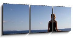 Obraz   girl sitting on rock over ocean, 150 x 50 cm