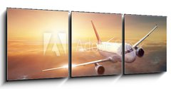 Obraz 3D třídílný - 150 x 50 cm F_BM44261036 - Airplane in the sky at sunset - Letadlo na obloze při západu slunce