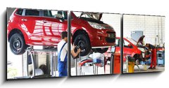 Obraz 3D tdln - 150 x 50 cm F_BM71143570 - Reifenwechsel in einer KFZ Werkstatt // Tire change by mechanic - Reifenwechsel in einer KFZ Werkstatt // Zmna pneumatik mechanikem