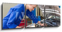 Obraz   Mechanic examining under hood of car with torch, 150 x 50 cm