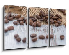 Obraz 3D tdln - 90 x 50 cm F_BS100905478 - Coffee beans lying on the table 