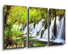 Obraz 3D třídílný - 90 x 50 cm F_BS107722539 - Scenic waterfall with crystal clear water among green forest - Scénický vodopád s křišťálově čistou vodou mezi zelenými lesy