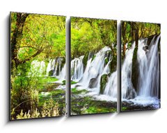 Obraz 3D tdln - 90 x 50 cm F_BS107722539 - Scenic waterfall with crystal clear water among green forest