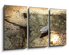 Obraz   paper ship floats in a spring pool, 90 x 50 cm