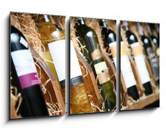Obraz   Closeup shot of wineshelf. Bottles lay over straw., 90 x 50 cm