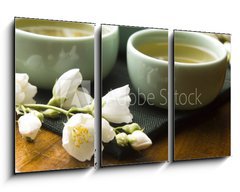 Obraz 3D tdln - 90 x 50 cm F_BS42047983 - Green tea with jasmine in cup and teapot on wooden table