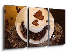 Obraz   Latte on wooden table on brown background, 90 x 50 cm