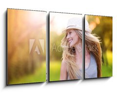 Obraz 3D tdln - 90 x 50 cm F_BS76895615 - Beautiful woman outside in a park.