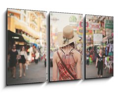 Obraz   Young woman walking in Khao San, Bangkok, 90 x 50 cm
