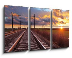 Obraz 3D tdln - 90 x 50 cm F_BS81148616 - Orange sunset in low clouds over railroad