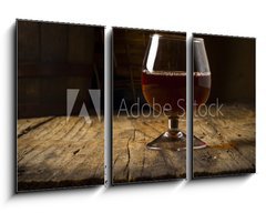 Obraz 3D tdln - 90 x 50 cm F_BS94348005 - Glass white wine and bunch grapes on background of wooden 