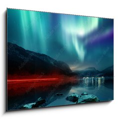 Obraz   A large Northern Lights (aurora borealis) display glowing over a mountain pass and reflected on a lake at night. Photo composition., 100 x 70 cm