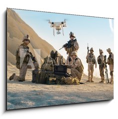 Obraz 1D - 100 x 70 cm F_E164038449 - Soldiers are Using Drone for Scouting During Military Operation in the Desert. - Vojci pouvaj dron ke skautingu bhem vojensk operace v pouti.