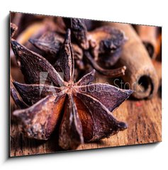 Obraz 1D - 100 x 70 cm F_E222904649 - close up of star anise on wooden plank, slective focus