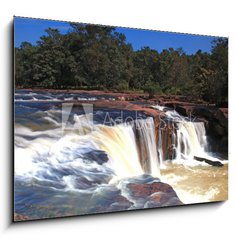 Sklenn obraz 1D - 100 x 70 cm F_E28916872 - waterfall Tadtone in climate forest of Thailand