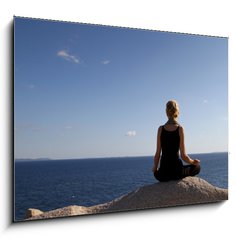 Obraz 1D - 100 x 70 cm F_E35709780 - girl sitting on rock over ocean