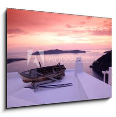 Sklenn obraz 1D - 100 x 70 cm F_E41448704 - Santorini with boat on white roof against sunset in Greece