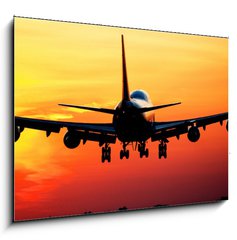 Sklenn obraz 1D - 100 x 70 cm F_E41906530 - Plane landing by sunrise - Pistn letadla po vchodu slunce