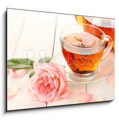 Obraz 1D - 100 x 70 cm F_E45691138 - teapot and cup of tea with roses on white wooden table