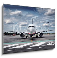 Obraz 1D - 100 x 70 cm F_E51423285 - Total View Airplane on Airfield with dramatic Sky