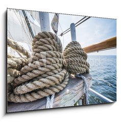 Obraz 1D - 100 x 70 cm F_E63459591 - Wooden pulley and ropes on old yacht.