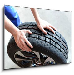 Sklenn obraz 1D - 100 x 70 cm F_E66921054 - Reifenwechsel in einer KFZ Werkstatt // Tire change by mechanic