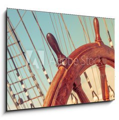 Obraz 1D - 100 x 70 cm F_E68023359 - Steering wheel of old sailing vessel