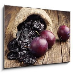 Obraz 1D - 100 x 70 cm F_E70640969 - Prunes with plums in small sack