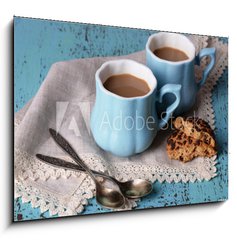 Obraz 1D - 100 x 70 cm F_E71101894 - Cups of coffee with cookies and napkin on wooden table