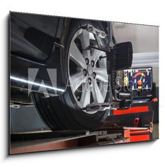 Obraz 1D - 100 x 70 cm F_E74461674 - Car on stand with sensors on wheels for wheels alignment camber