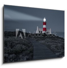 Obraz 1D - 100 x 70 cm F_E78333041 - Lighthouse with shining light in darkness and dark blue clouds a