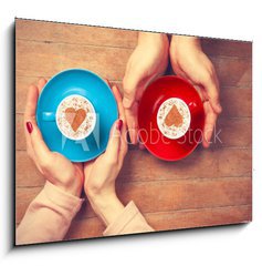 Obraz 1D - 100 x 70 cm F_E79045228 - Women and man holding cups of coffee